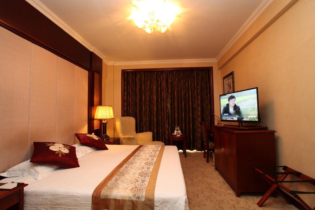Milky Way Hotel Харбин Стая снимка
