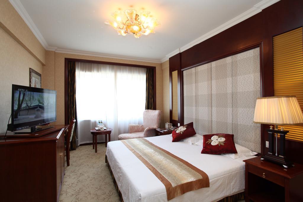 Milky Way Hotel Харбин Стая снимка